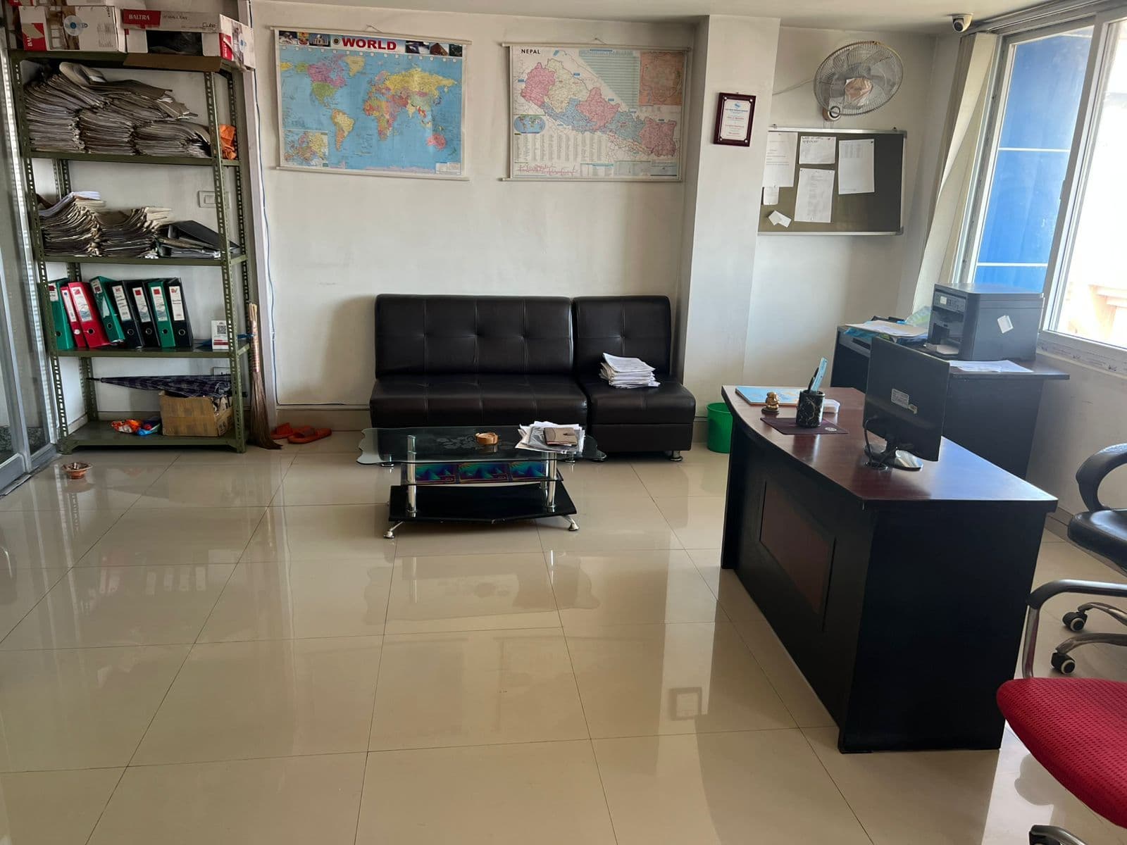 Office interior workspace with world map